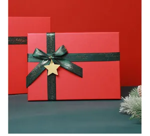 Red Christmas Gift Box with Green Ribbon and Gold Star Pendant for Holiday Present Packaging
