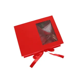 Red gift box with transparent window and ribbon, minimalist medium flip cover box for floral gifts.