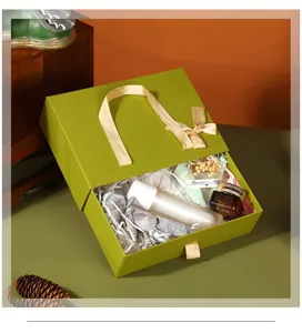 Retro green gift box with ribbon handle, large rectangular drawer packaging box for cosmetics.