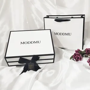 Minimalist Black And White Flip Gift Box Cosmetic Skincare Packaging Box With Ribbon Bowknot And Gift Bag
