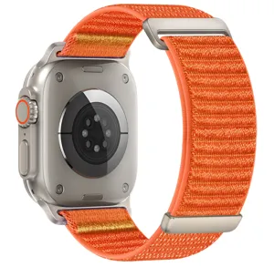 Detailed view of smartwatch orange alpine loop nylon band with back sensor structure.