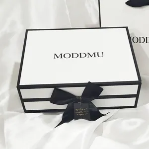 Large black and white minimalist flip gift box for cosmetics skincare packaging with ribbon.