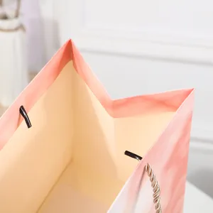 Exquisite pink gradient paper gift bag for wedding birthday clothing packaging shopping handbag.