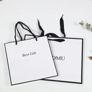 White paper gift bag luxury large shopping bag minimalist clothing paper packaging bag.
