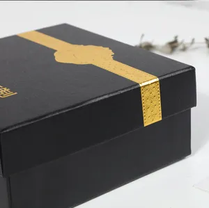 Luxury black belt gift box detail with gold stamping, perfect for business and high-end packaging.