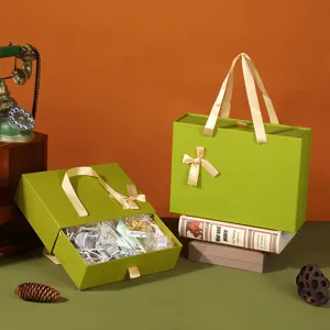 Vintage green gift box large rectangular cosmetic storage box with handle and ribbon bow for presents.