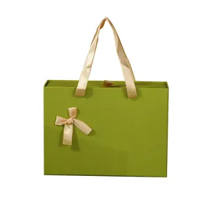 Retro green gift box with ribbon handle, large rectangular cosmetic and storage packaging box.