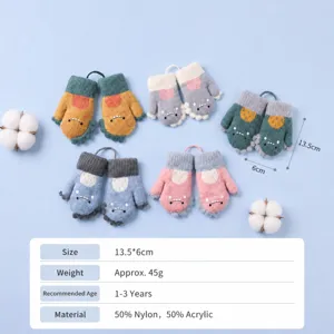 Detailed view of cute dinosaur toddler winter knit mittens with warm neck hanging design.