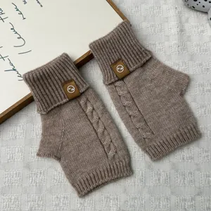Knit fingerless gloves detailed view, winter warm half-finger arm warmers with cable knit.