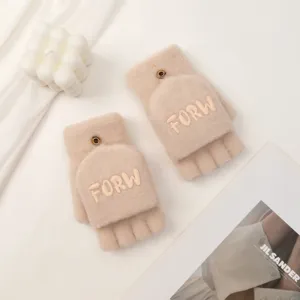 Convertible knit gloves for women, warm winter fingerless design with buttons and stylish lettering.