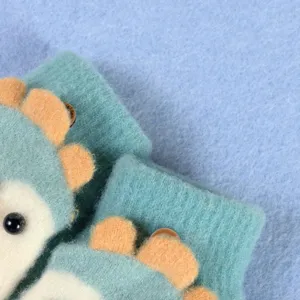 Close-up detail of cute cartoon plush half-finger gloves for kids, soft fleece material.