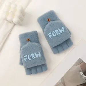 Cute fuzzy half-finger convertible gloves in light blue, warm winter knitwear with button flip.