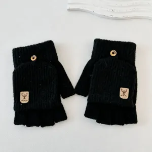 Close-up of black convertible half-finger knit gloves with cozy warm design for typing.