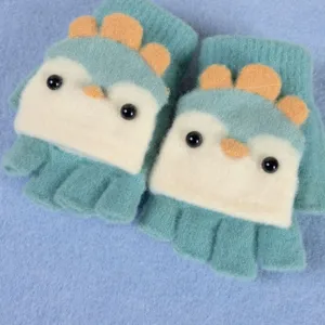 Cute cartoon dinosaur design children half finger knit gloves detail view, soft warm winter wear.