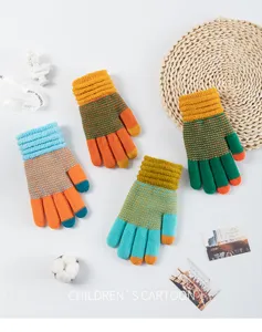 Detailed view of colorful striped knitted gloves with touchscreen fingertips, cozy winter wear.