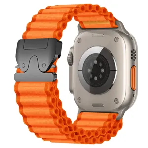 Detail view of orange nylon alpine loop watch band with parachute buckle for smart watch.