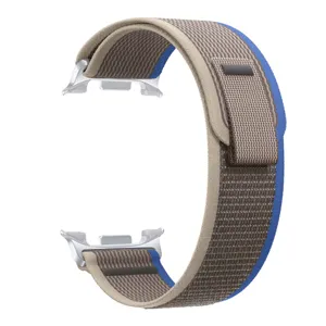 Detailed view of the nylon alpine loop watch strap with metal buckle and connector.