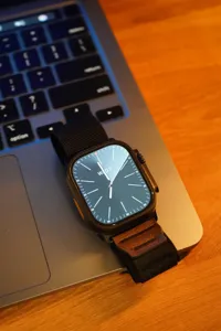 Alpine nylon loop watch strap with vintage leather patch for smartwatch details.