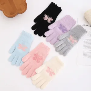 Winter warm knitted gloves for women, cute butterfly jacquard pattern, thick fleece-lined detail.