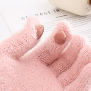 Pink knit winter warm fuzzy fingerless gloves, soft thick material for women daily wear.