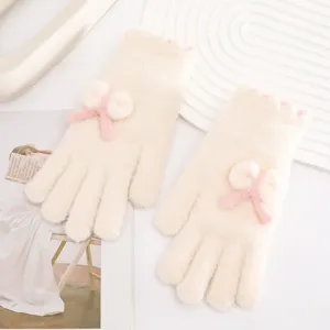 Fluffy thermal knit winter gloves featuring cute pink bows, soft touch screen cozy wear.