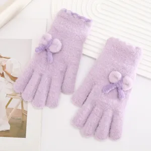 Winter plush knit gloves for women, warm fleece-lined split finger design with cute bow.