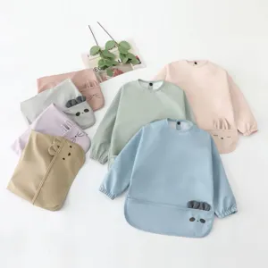 Cute waterproof long-sleeve baby bib with animal ears pocket for feeding and painting.