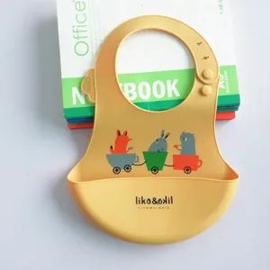 Waterproof silicone baby bib with crumb catcher, soft infant feeding bib for easy cleaning.