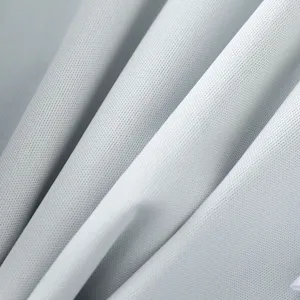 Close-up view of light gray waterproof fabric texture, soft mesh detail for baby accessories.