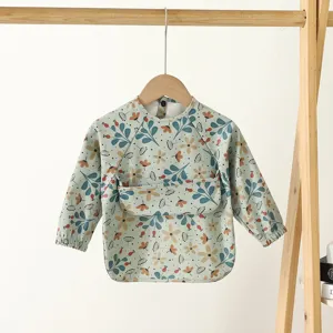Waterproof baby long sleeve bib with pocket, cute floral pattern infant feeding smock for dining.