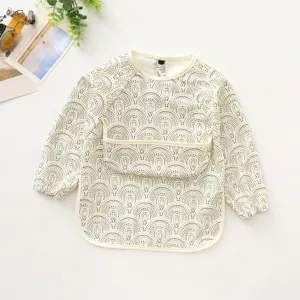 Waterproof long sleeve baby bib with cute pattern, perfect for messy eating and art time.