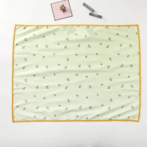 Detailed view of Korean style baby waterproof changing mat with cute olive print design.