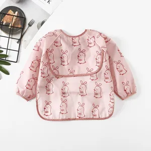 Waterproof baby long sleeve smock detail showing cute rabbit print and waterproof fabric texture.