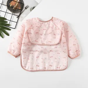 Baby long sleeve waterproof bib and feeding smock with cute duck pattern for infants and toddlers.