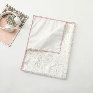 Baby waterproof urine pad detail, cute floral cartoon print, soft and portable bed mat design.