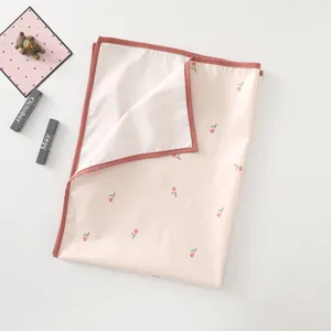 Korean style baby waterproof urine pad with cute tulip print, soft fabric and pink border mat.