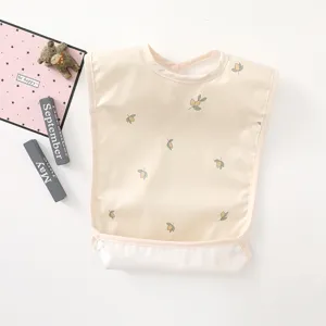 Waterproof baby bib with cute lemon print, lightweight and easy to clean for toddlers.