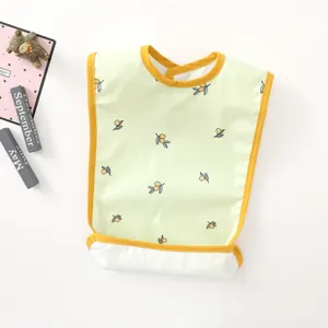 Waterproof baby bib with cute olive print and crumb catcher pocket for feeding time.