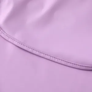 Lavender waterproof children smock fabric detail, smooth texture and neat stitching.