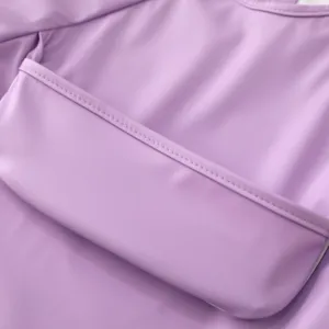 Baby waterproof smock bib detail shot, light purple feeding coverall pocket view.