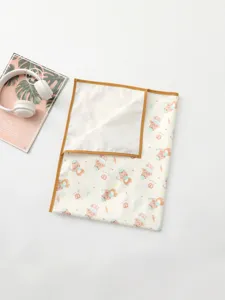 Waterproof baby urine pad with cute cartoon bear pattern, portable infant diaper changing mat.