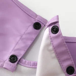 Detailed view of waterproof children coverall snap buttons and neat edge stitching texture.