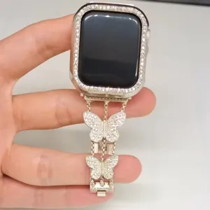 Correa de reloj metalica con diamantes de imitacion y eslabones de mariposas vista detallada