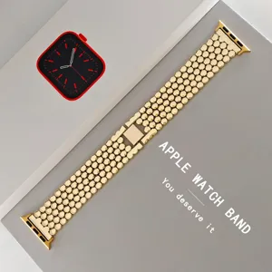 Dettaglio del cinturino per orologio in metallo dorato, ricambio in acciaio inox.