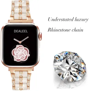Close-up detail of luxury rose gold metal and white resin rhinestone watch strap for smart watch.