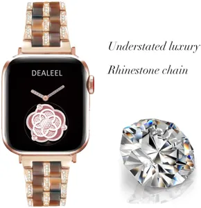 Detailed view of luxury resin watch strap with sparkling rhinestones and rose gold metal links.