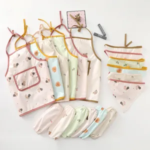 Cute waterproof baby apron sleeves and triangle scarf set with cute animal prints for feeding.