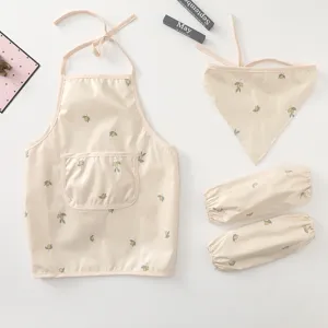 Kids waterproof apron detail showing cute lemon print design and fine stitching quality.
