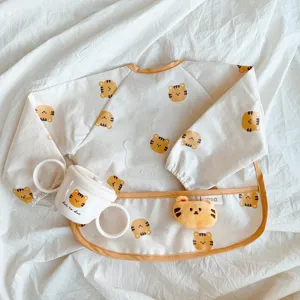 Cute baby waterproof long sleeve bib with cute tiger print and matching cup set detail view