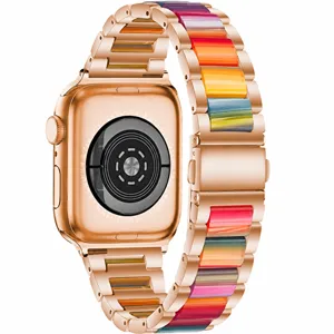 Details of the rose gold smartwatch with colorful resin metal strap showcasing back sensor.